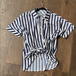 Navy blue and white striped tie top
